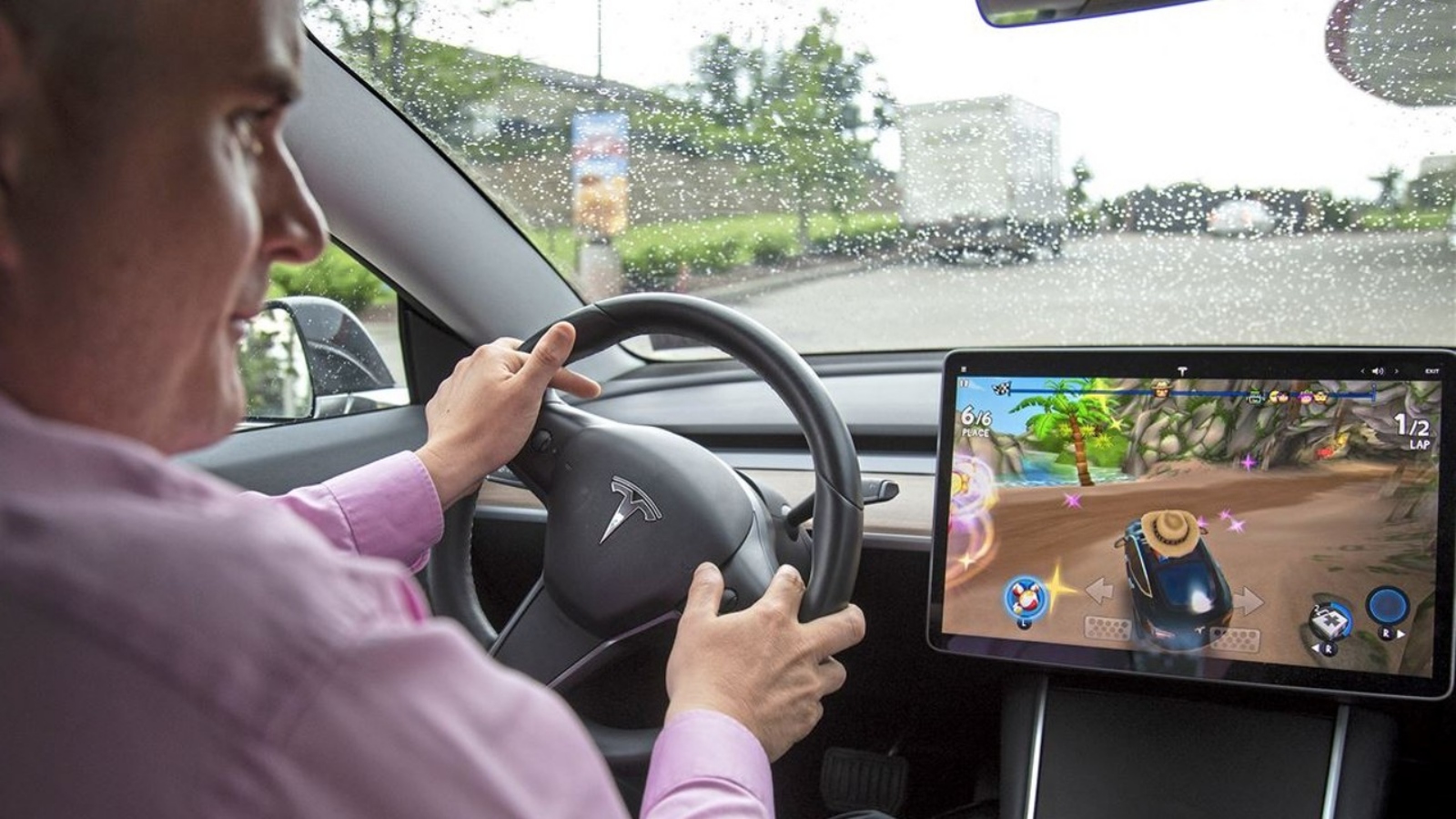 Drive player. Tesla игра. За рулем автомобили Tesla. За рулем Теслы. Тесла игры в машине.